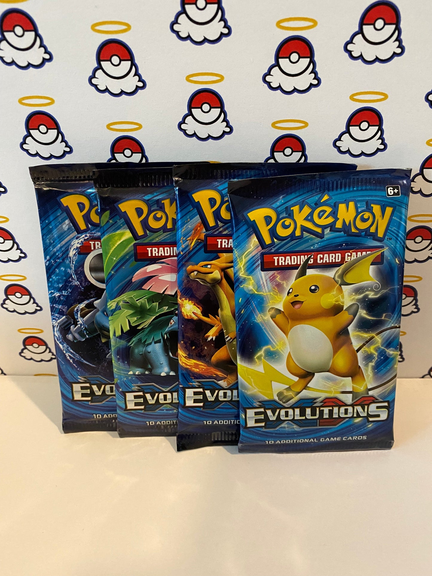 Evolutions Booster Pack Art Set (x4)